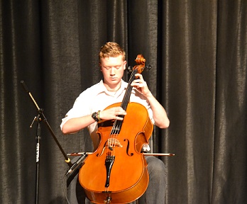 Ethan Schlenker swept the talent portion of Mr. U-High with his cello performance.