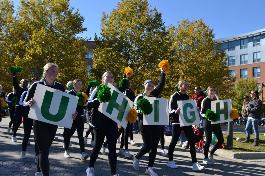 U-High cheerleaders march in the ISU Homecoming parade at the uptown circle in Normal. 