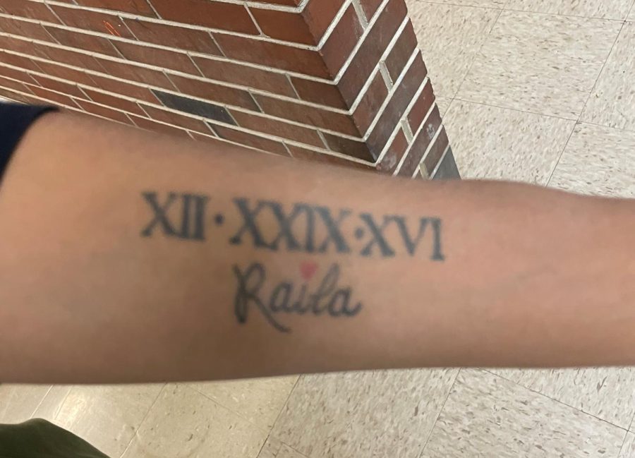 The display of Roman numerals on junior Karianna Merriweather’s forearm depicts the date of her cousin’s death.  