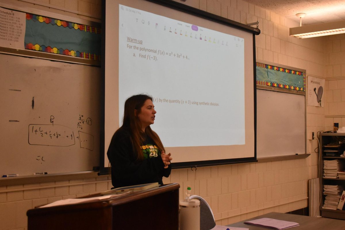 Math teacher Kylie Cassulo teaching her Algebra 2/Trigonometry class