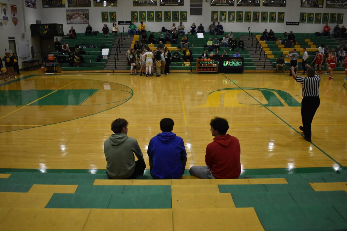 The student section at the varsity girls basketball game against Ottawa on February 4, 2025. The game ended with a loss for the Lady Pioneers 30-37. 