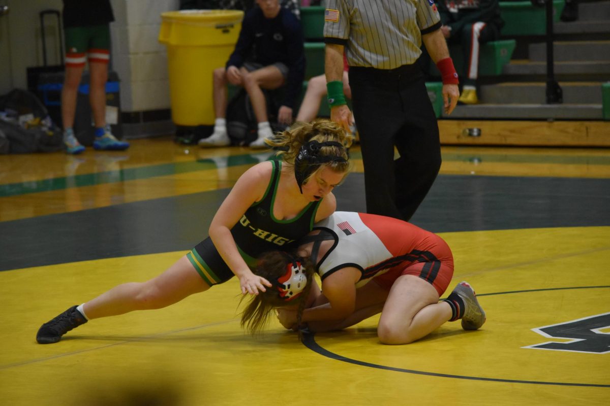 Hailey Watson (10)  uses a single leg defense against her Lincoln opponent at the January 16th home meet. 